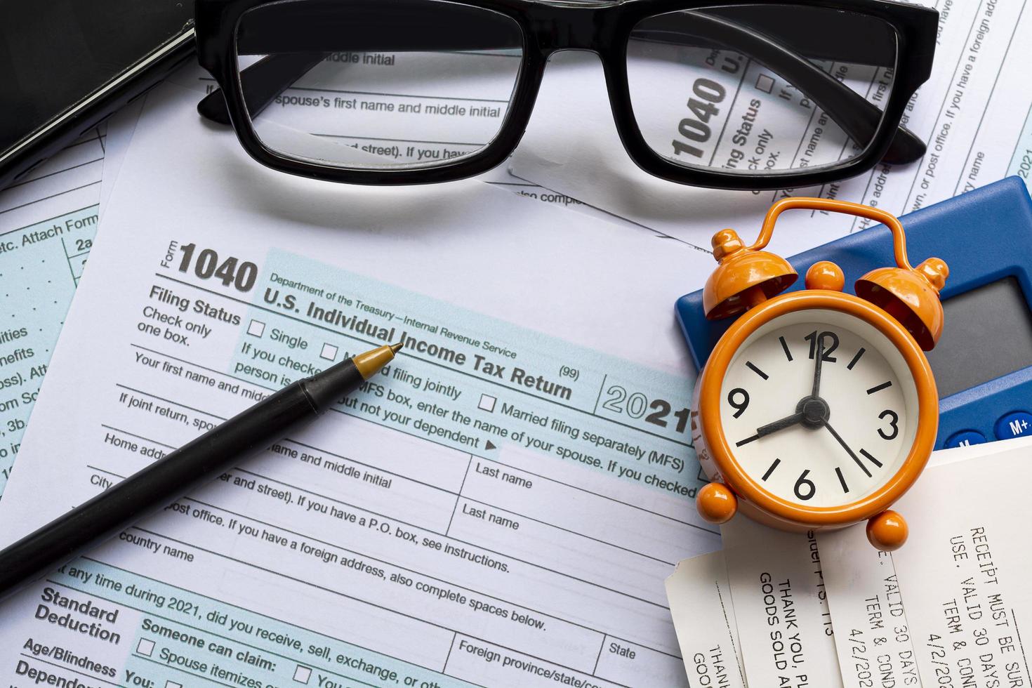 Tax forms 1040. U.S Individual Income Tax Return. Time to pay tax in year. photo