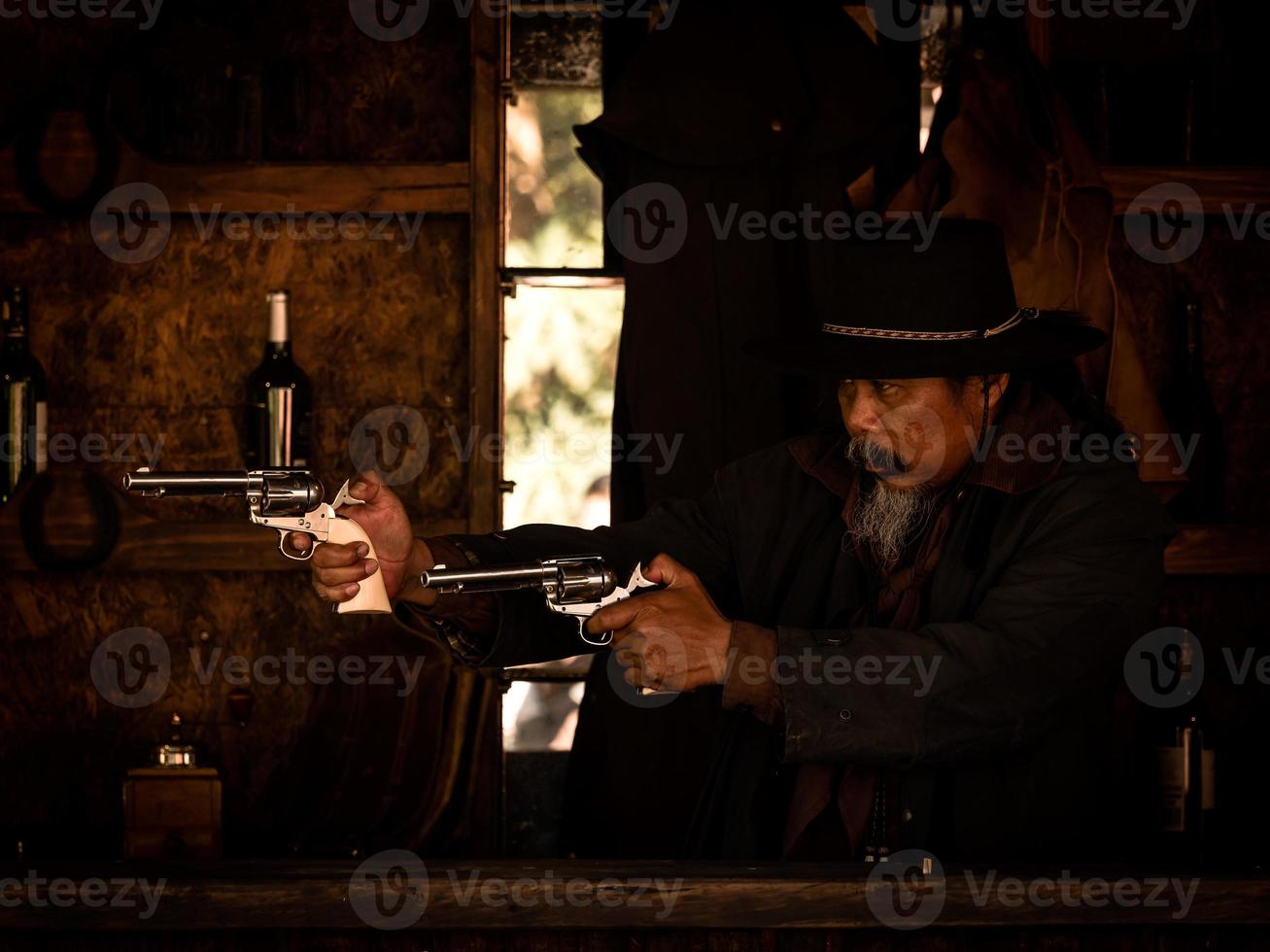 Western cowboys are using guns to fight to protect themselves in the tavern, On the land that the law has not yet reached photo