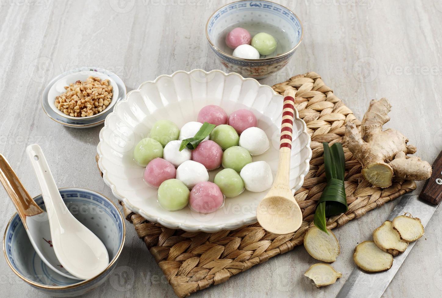 Wedang Ronde Jahe, Glutinous Rice Balls with Ginger and Palm Sugar Syrup. Popular as Tangyuan in Chinese Culture, Eat at Dongzhi Festival photo