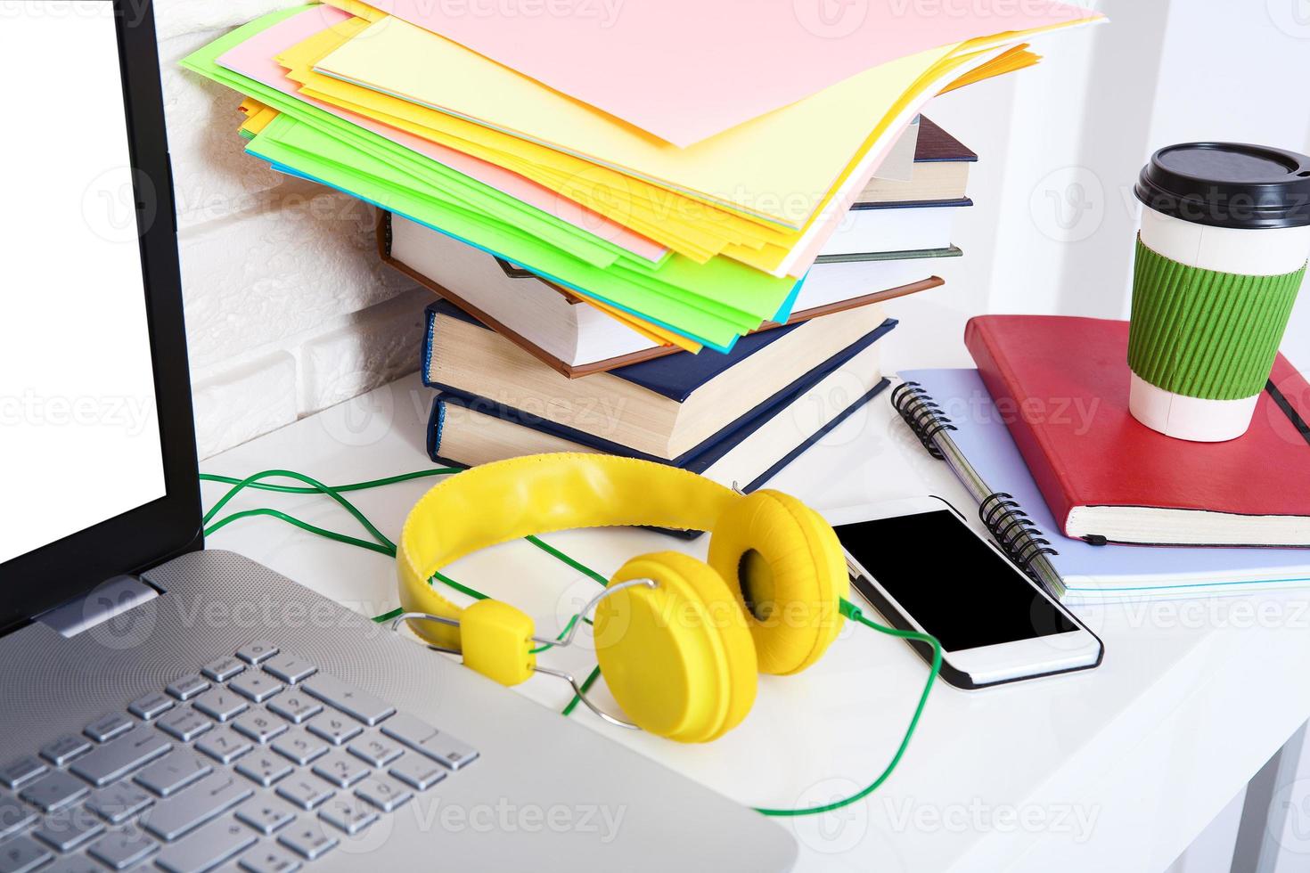 Workspace with computer and notebook. Copy space and top view. Selective focus photo