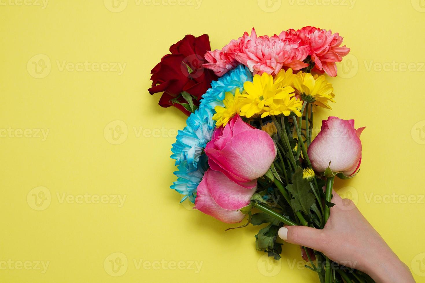 Send flowers online concept. Flower delivery for valentine and mother day. Bouquet of red pink roses isolated on violet background. Post card design with beautiful nature rose. Top view. copy space. photo