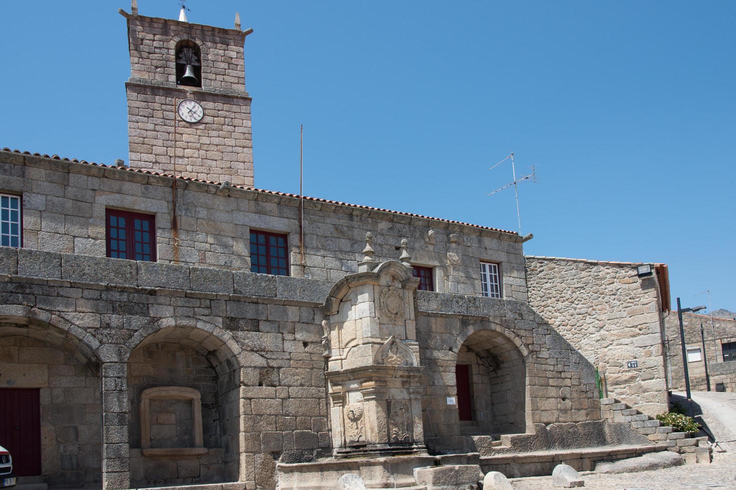 Ancient town hall of Castelo Novo and King Joao V fountain. Castelo Novo, Portugal photo