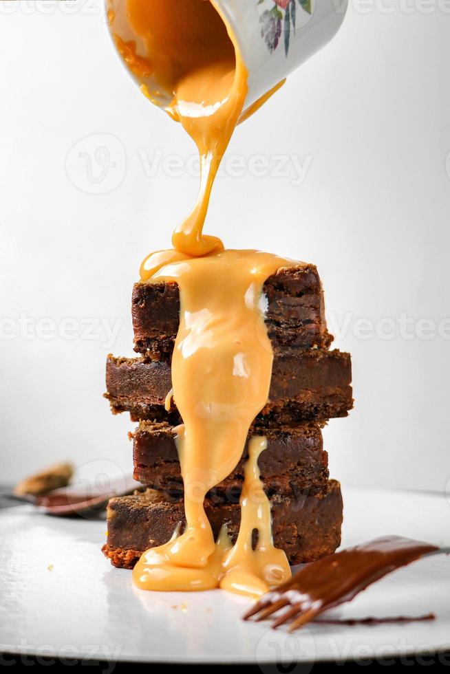 Brownies with milk faling photo