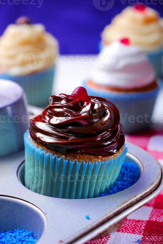 Cupcake close-up with chocolate photo