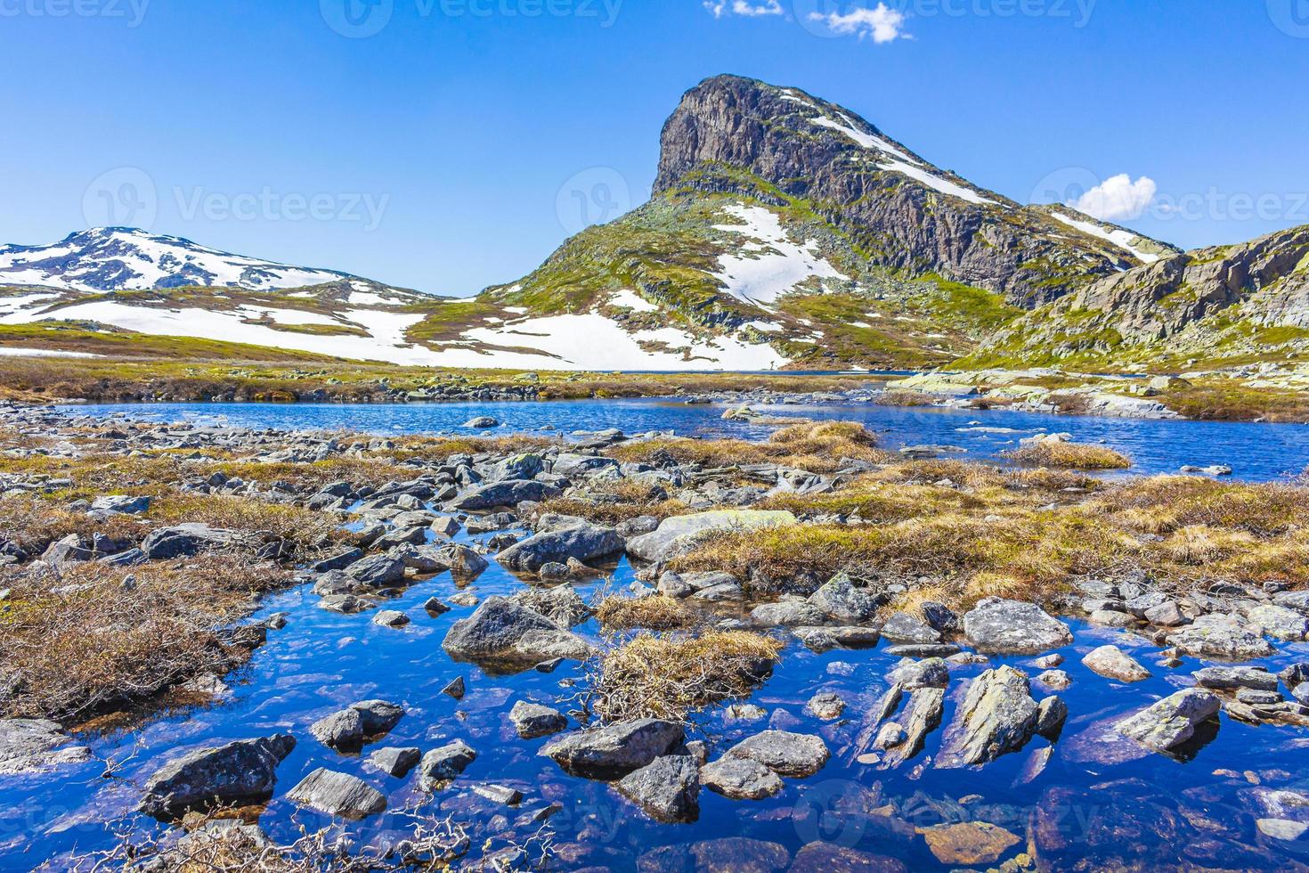 Amazing mountain peak at Veslehodn Veslehorn Hydnefossen waterfall Hemsedal Norway. photo