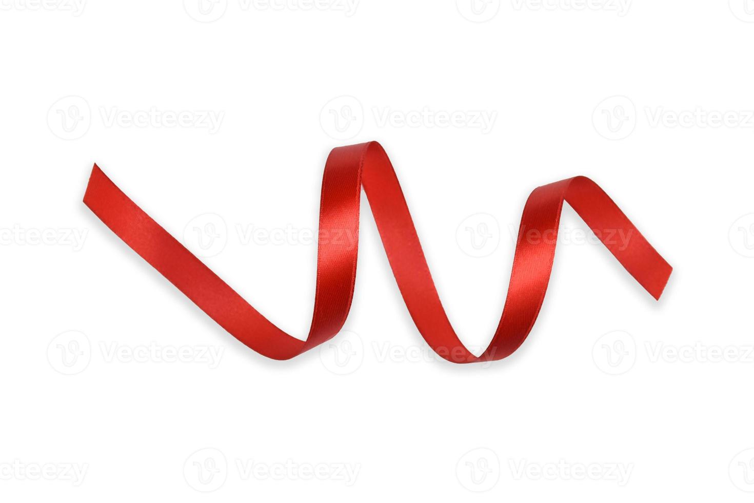 Clipping path. Closeup of Rolled Red ribbon isolated on white scene view.  Party. Ribbon rolled Decoration view. Top view. Flay lay. photo