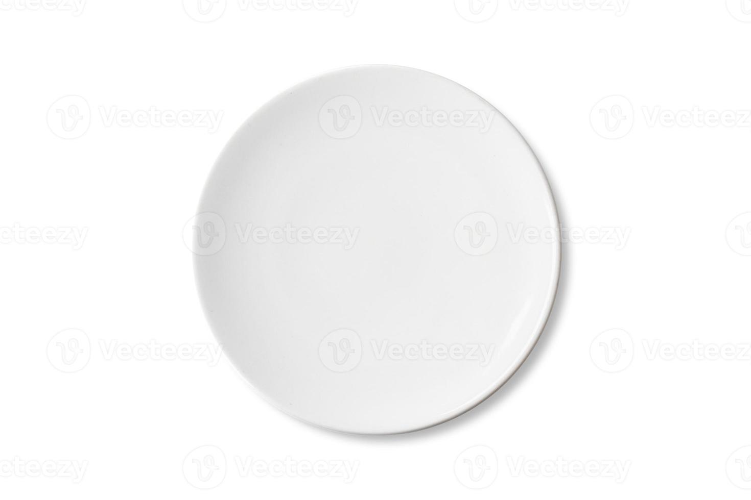 Clipping path. Top view of White dish ceramic isolated on white background. Flat lay of Circle dish. Plate isolated on white background. Mockup. Plate blank. Empty. Shiny plate isolated. photo