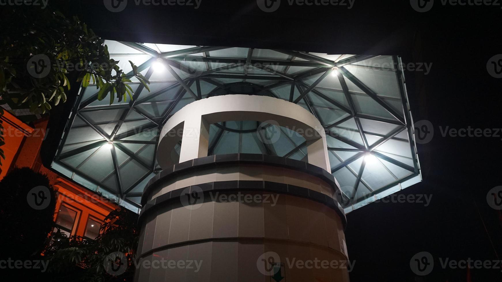 ablution place with a big roof and lots of lights photo