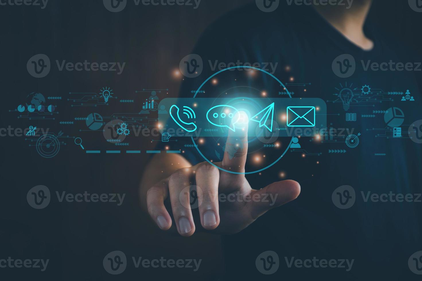 Concept Contact us or connected customer support hotline. businessman touching icon to communicate on a virtual screen,through a digital, global network. photo