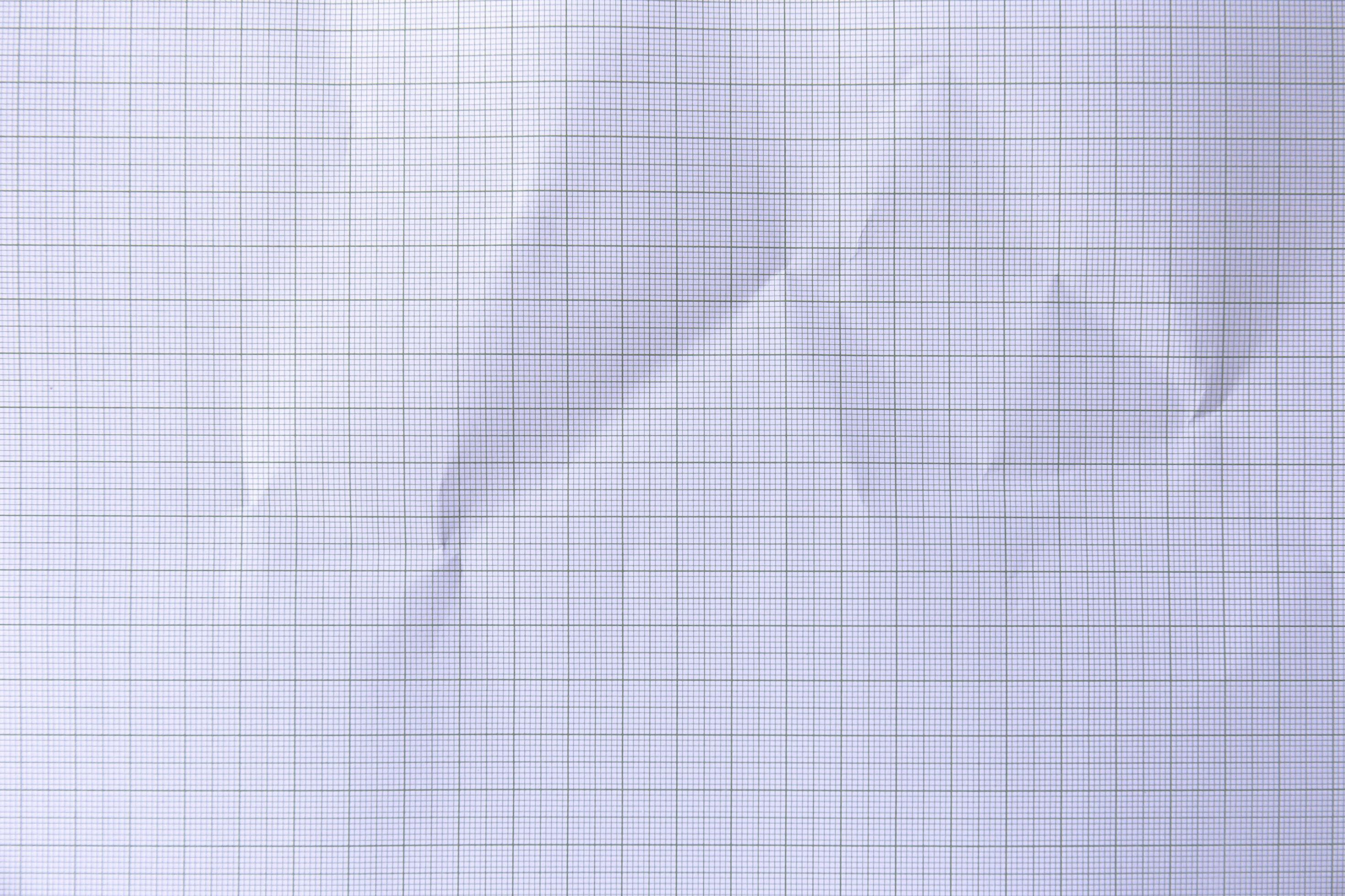 Square crumpled square graph paper on the background. 7325764 Stock
