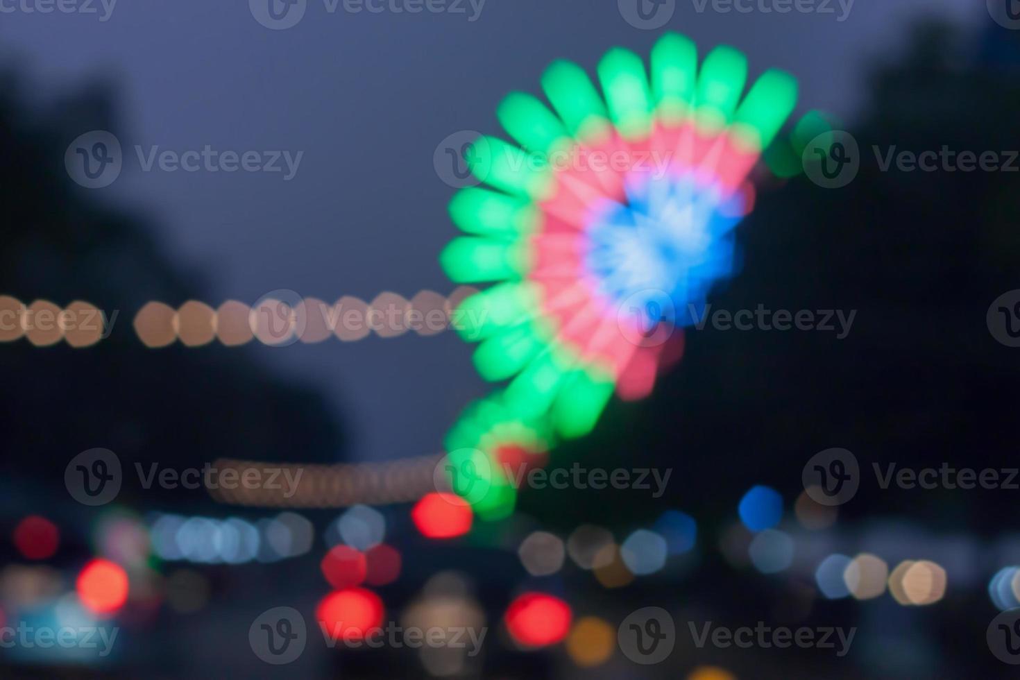 beautiful background of bokeh lights at night on road with car photo