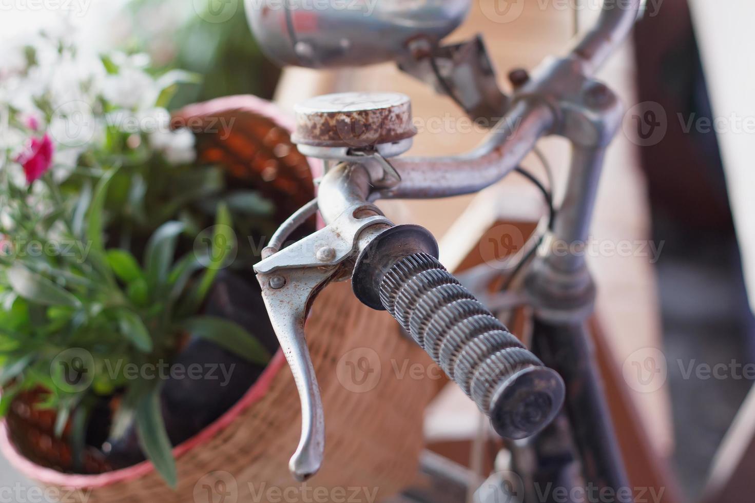 Old bicycle and flowers photo