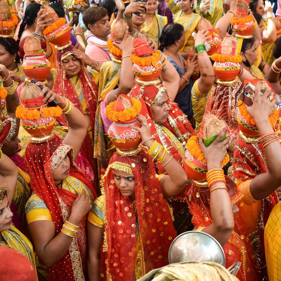 New Delhi, India April 03 2022 - Women with Kalash on head photo