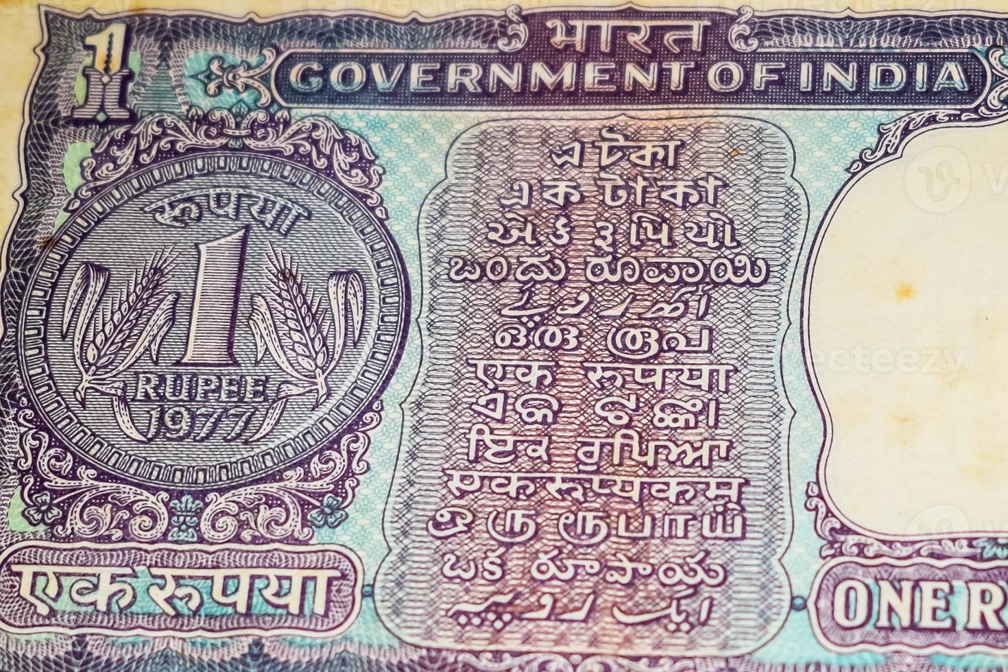 Old One Rupee notes combined on the table, India money on the rotating table. Old Indian Currency notes on a rotating table, Indian Currency on the table photo