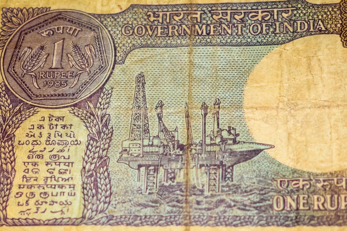 Old One Rupee notes combined on the table, India money on the rotating table. Old Indian Currency notes on a rotating table, Indian Currency on the table photo