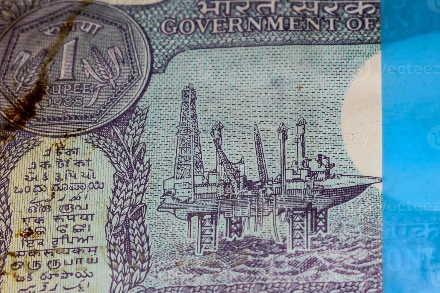 Old One Rupee notes combined on the table, India money on the rotating table. Old Indian Currency notes on a rotating table, Indian Currency on the table photo