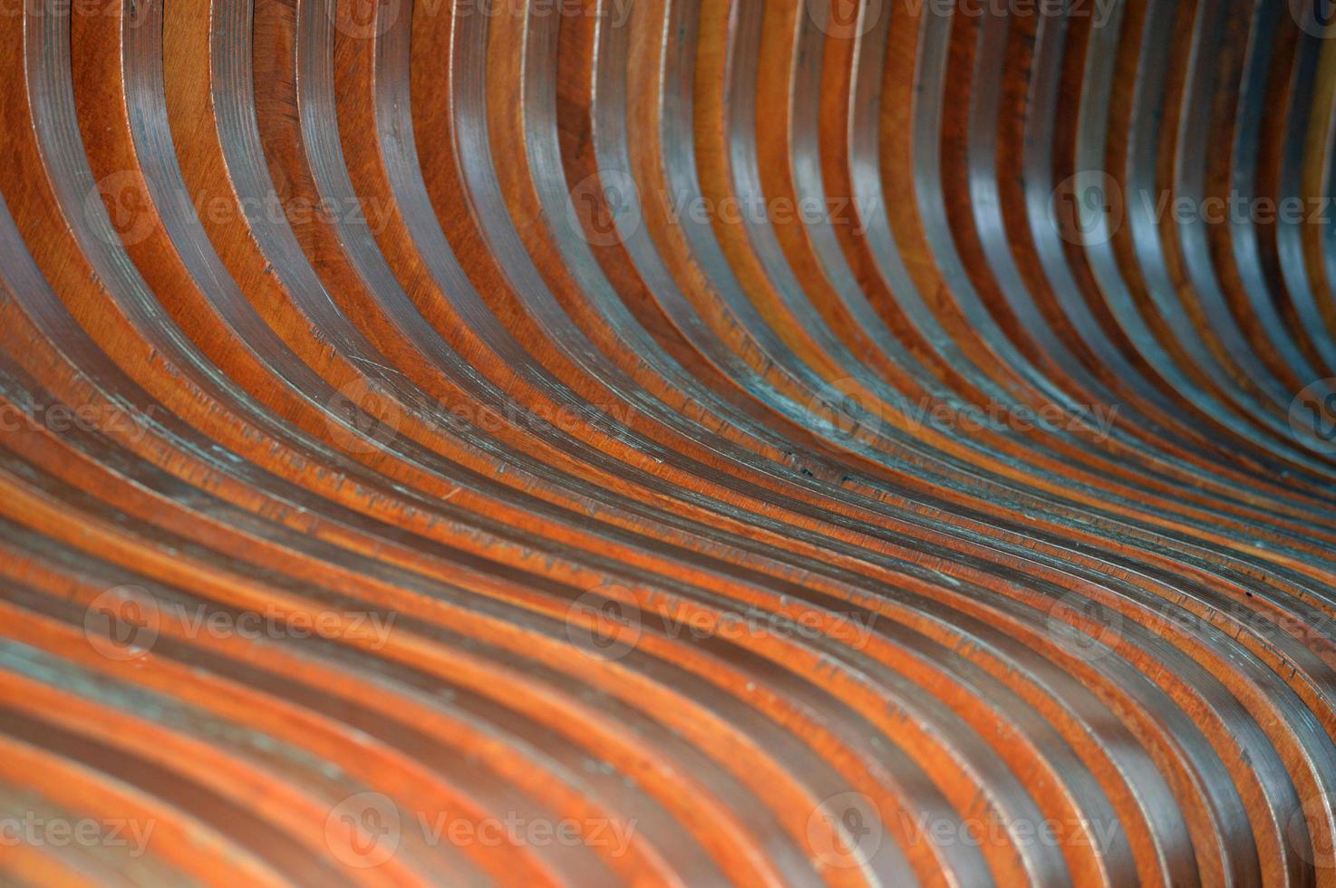 Texture of curved lacquered wooden planks. Abstract background. photo