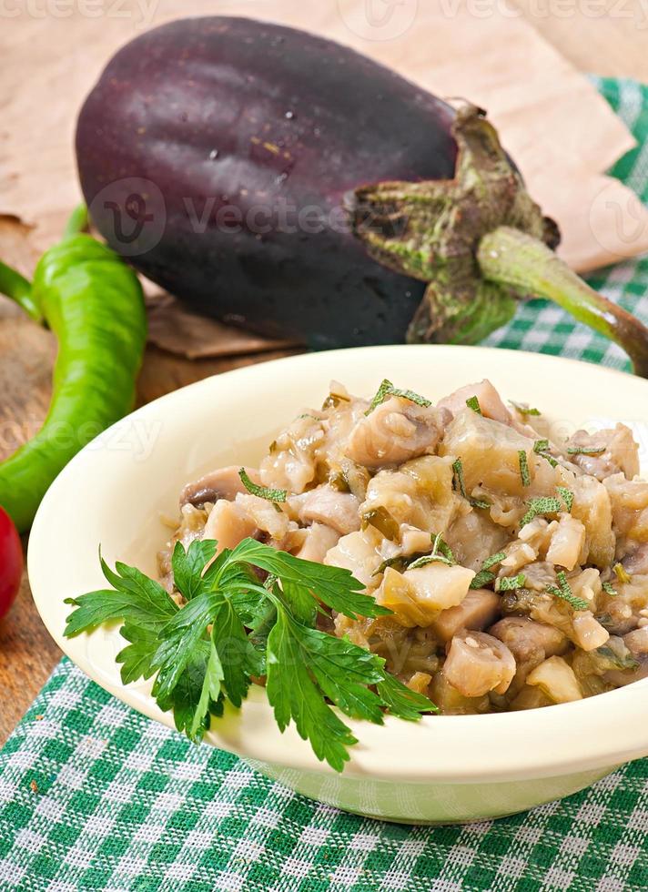 Sauteed mushrooms and eggplant photo