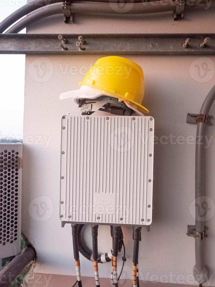 Powerline tranfermer energy home technology equipment electirc watt tool cable and yellow hardhat safety engineering danger project industry system plan building architecture station concept photo