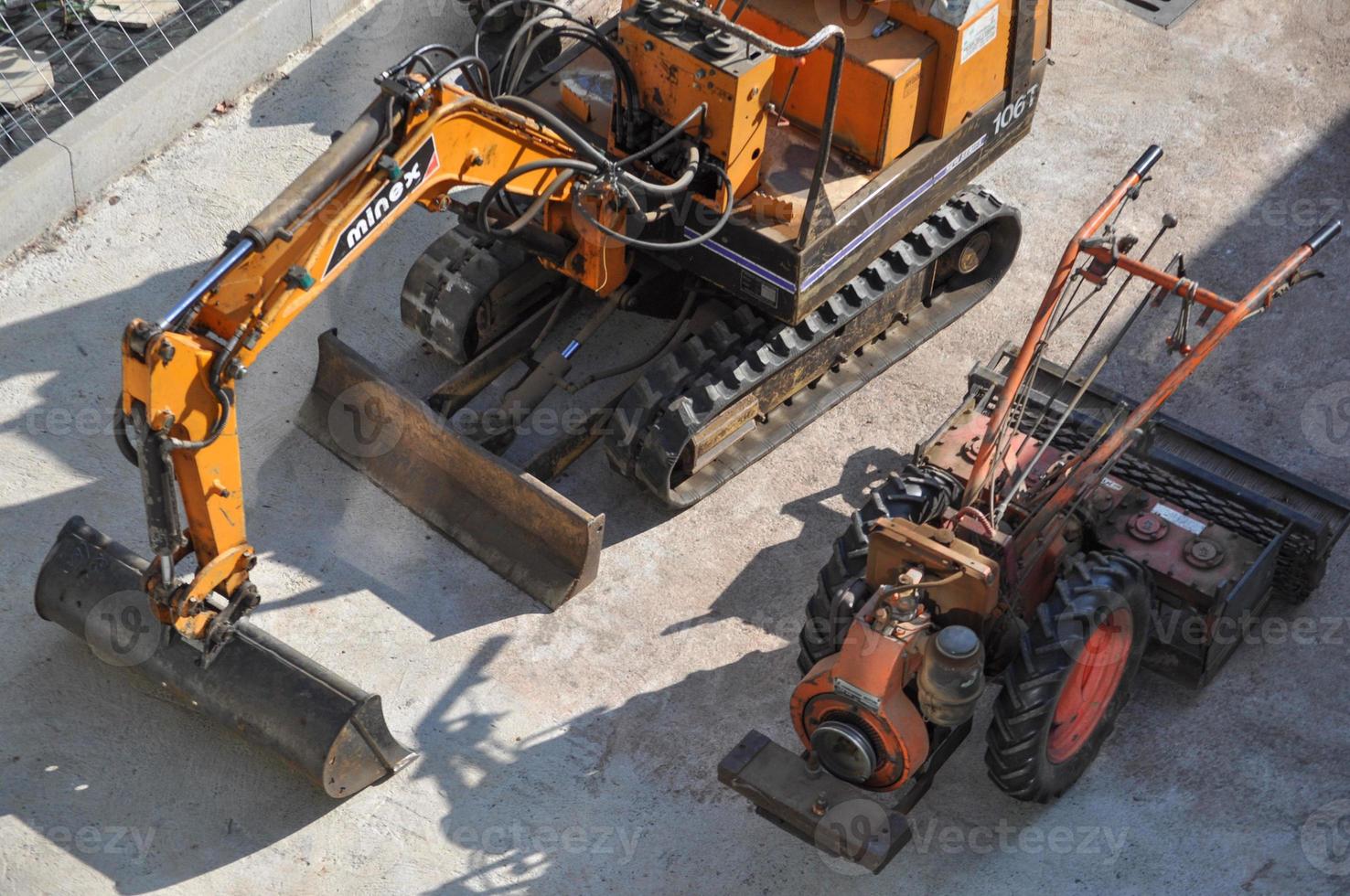 Excavator machine in construction site photo