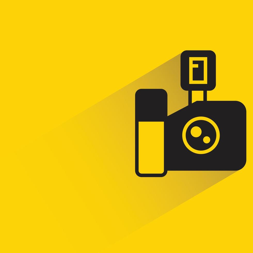 camera and flash icon yellow background vector illustration