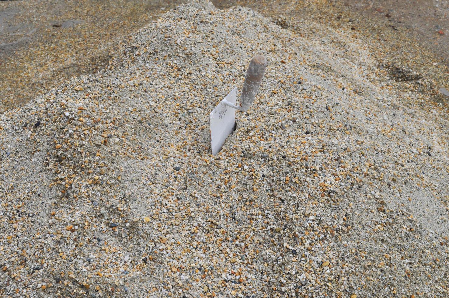 Trowel in sand photo