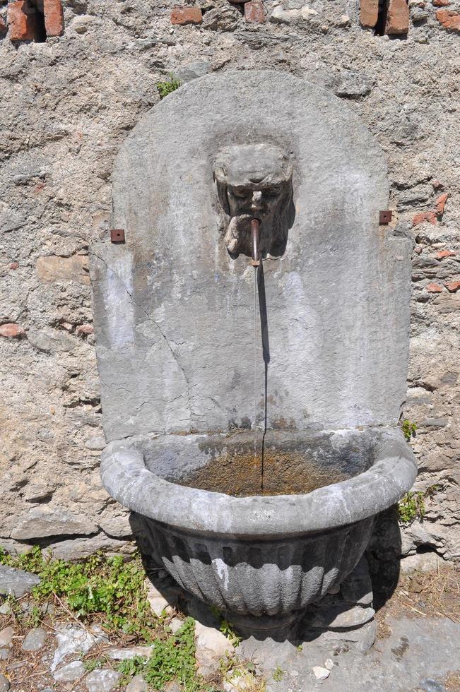 Ancient stone fountain photo