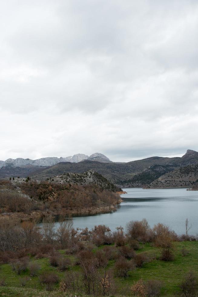 Vertical shot of the beautiful Natural park of Babia and Luna, between Leon and Asturias. Water reservoir and protected area. Spain photo