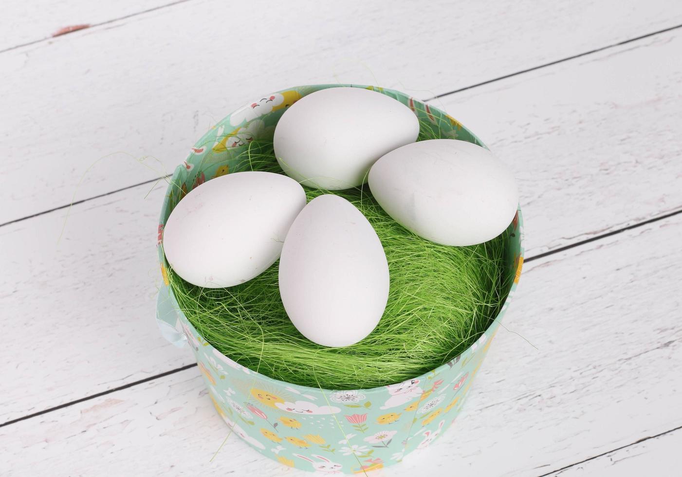 White eggs in a basket photo