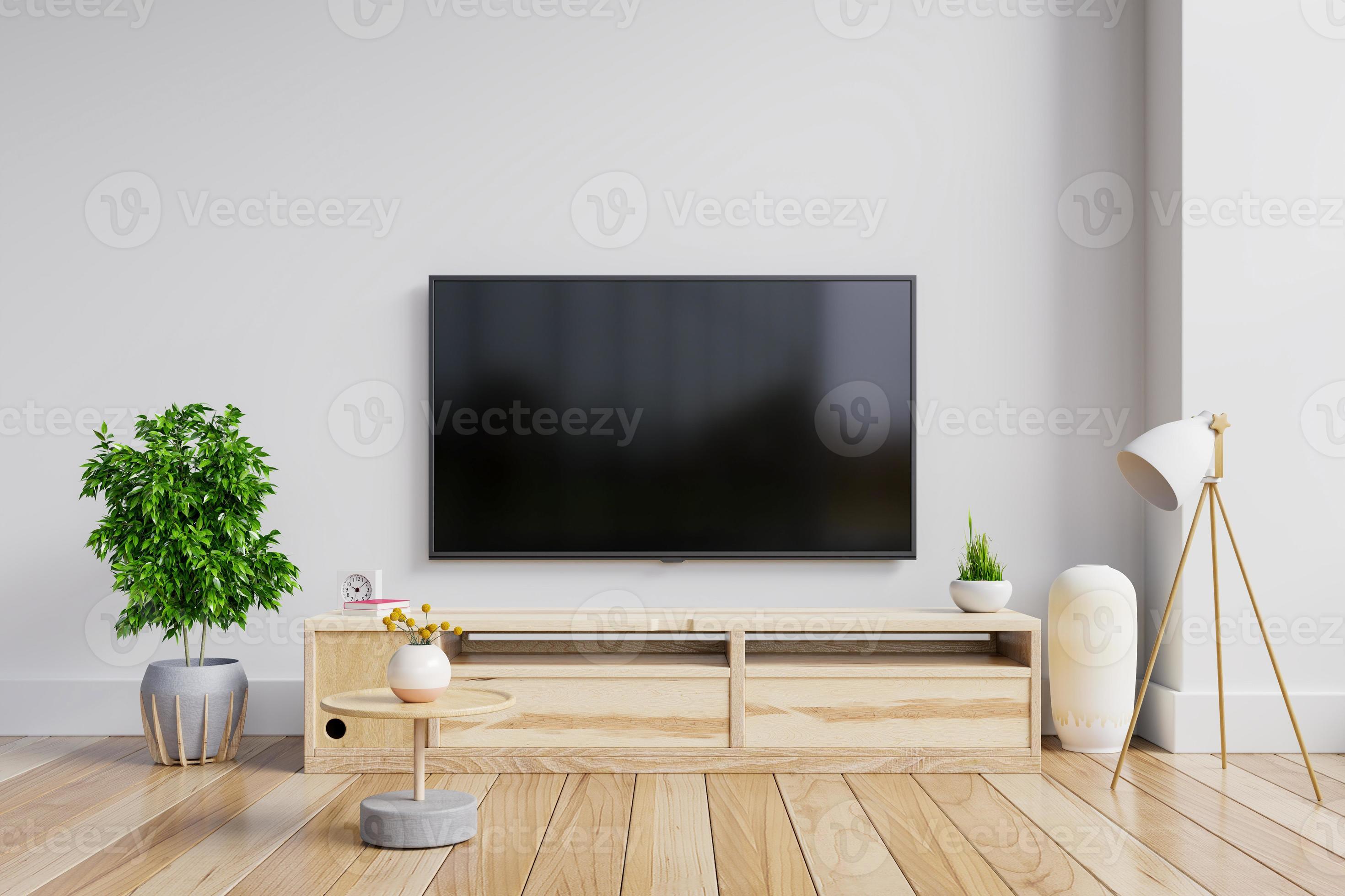 LED TV on the cabinet in modern living room on white wall background.  7334323 Stock Photo at Vecteezy