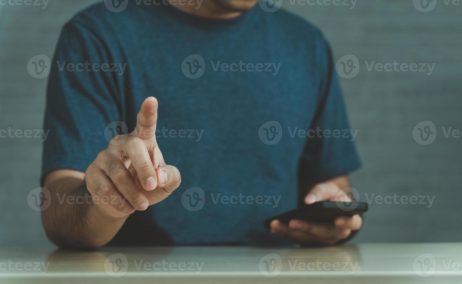 Man using fingerprint scan provides security access with biometrics identification on screen. Business Technology Safety Internet Network Concept. The security scanning of digital program. photo