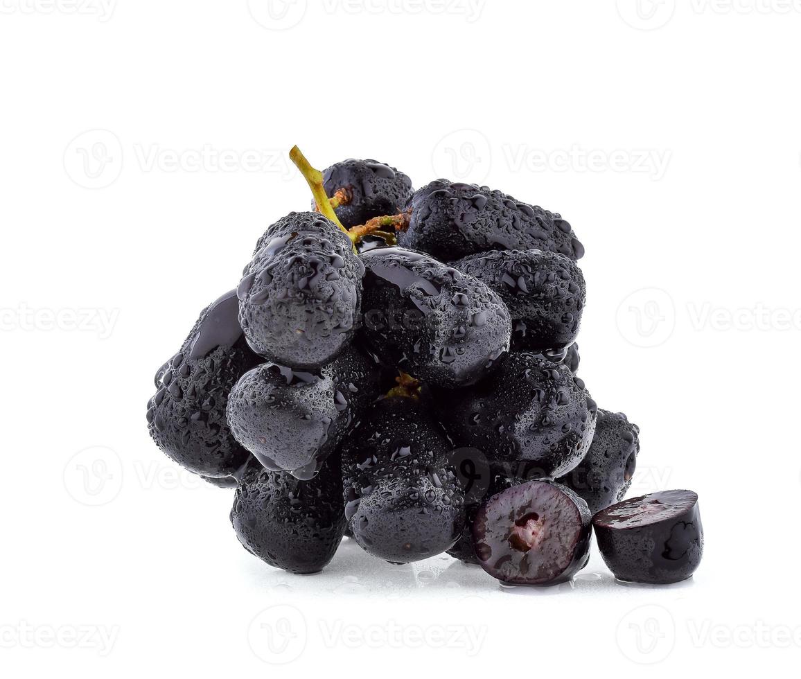 Black grapes with drop of water isolated on white background. photo