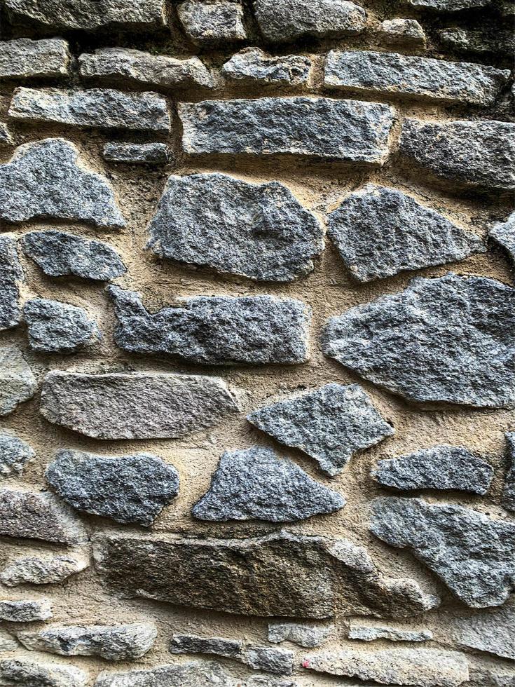 antiguo fondo de pared de piedra. telón de fondo de piedra foto