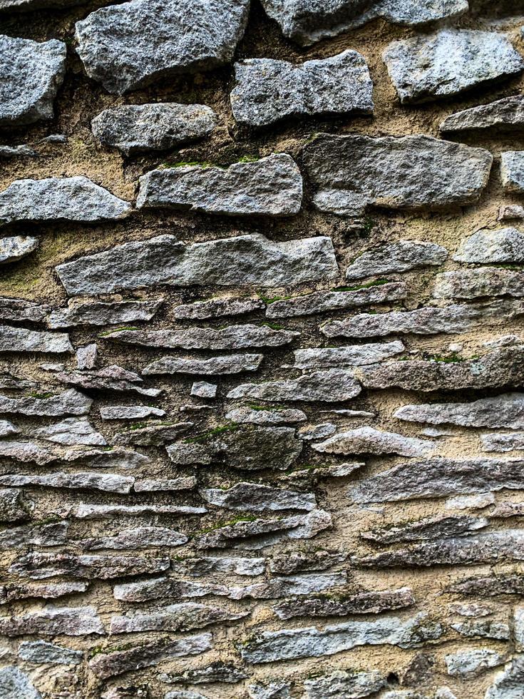 Old stone wall background. Stone backdrop photo