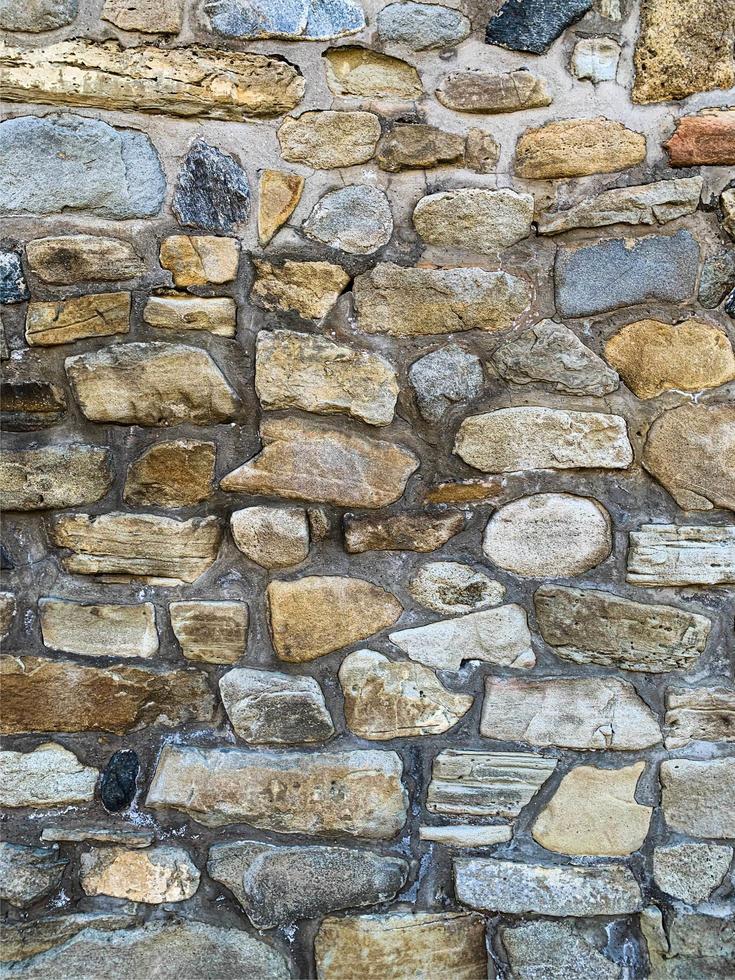 Old stone wall background. Stone backdrop photo