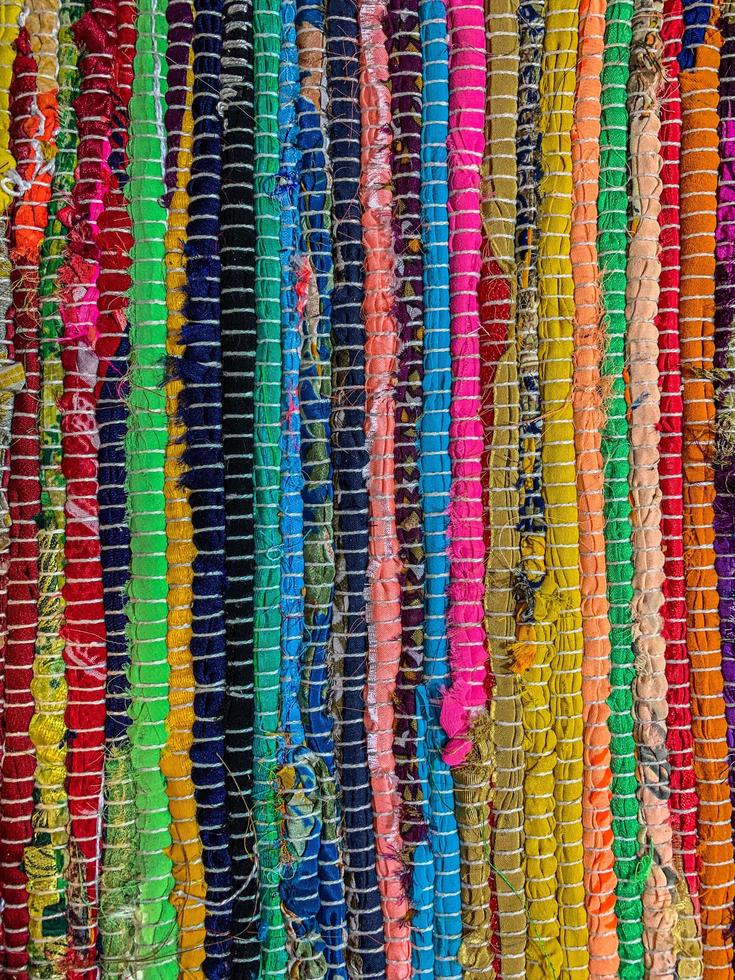 Colored textile carpet background. Carpet texture photo