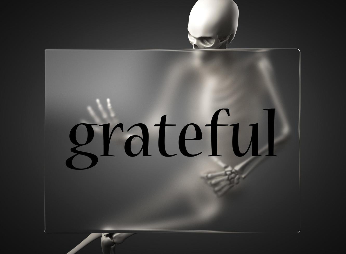 grateful word on glass and skeleton photo
