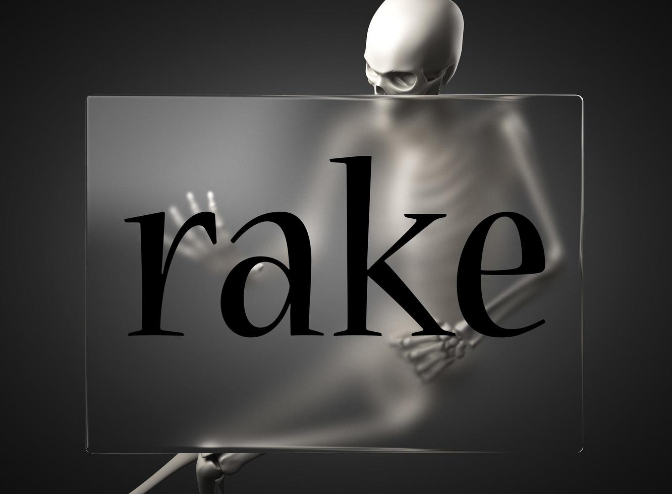 rake word on glass and skeleton photo