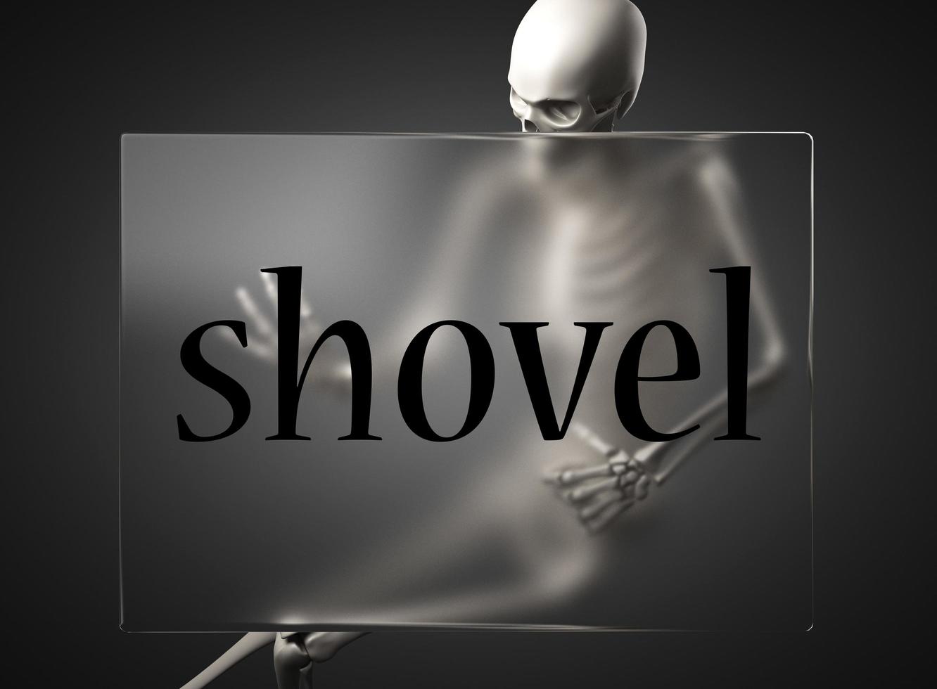 shovel word on glass and skeleton photo