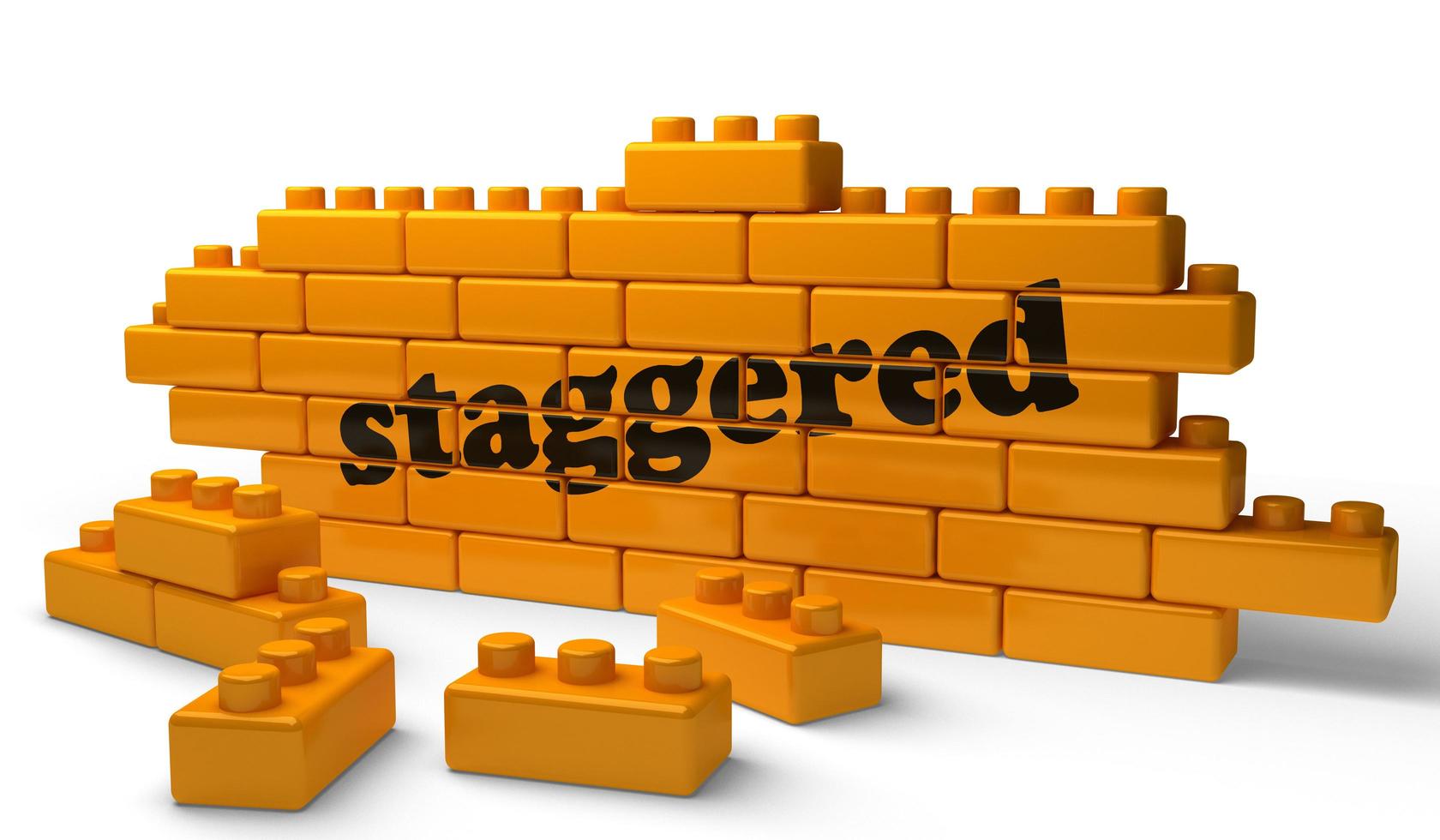 staggered word on yellow brick wall photo