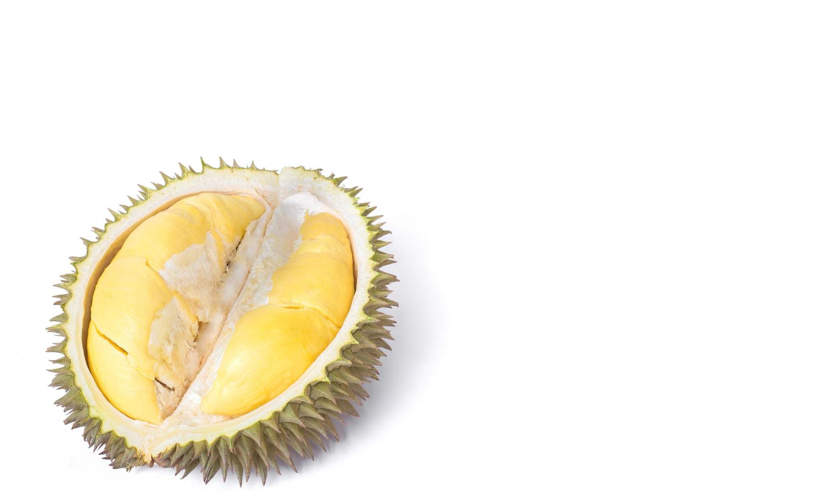 Rind of Durian has green brown color and covered with many thorns photo