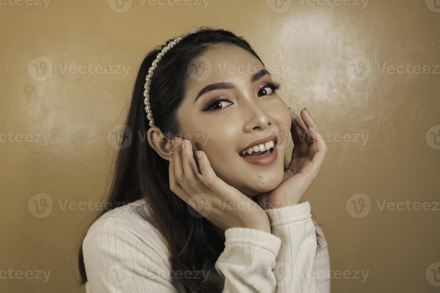 Beauty concept of a smiling asian woman. Skin care. Cosmetics. photo