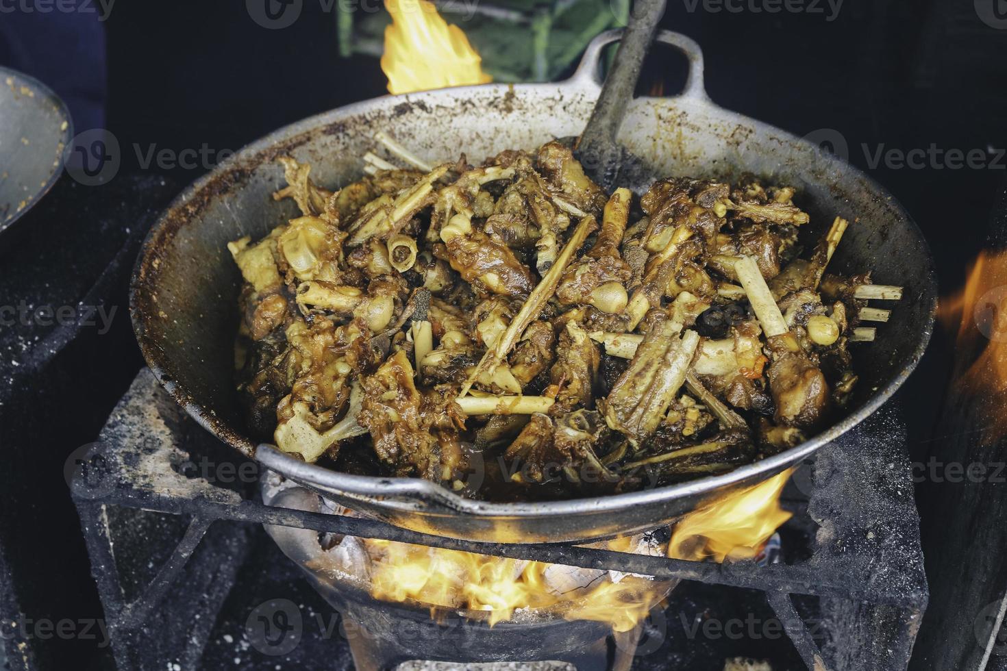 cooking tengkleng kambing or goat tengkleng is a kind of soup with the main ingredient of goat bones. photo
