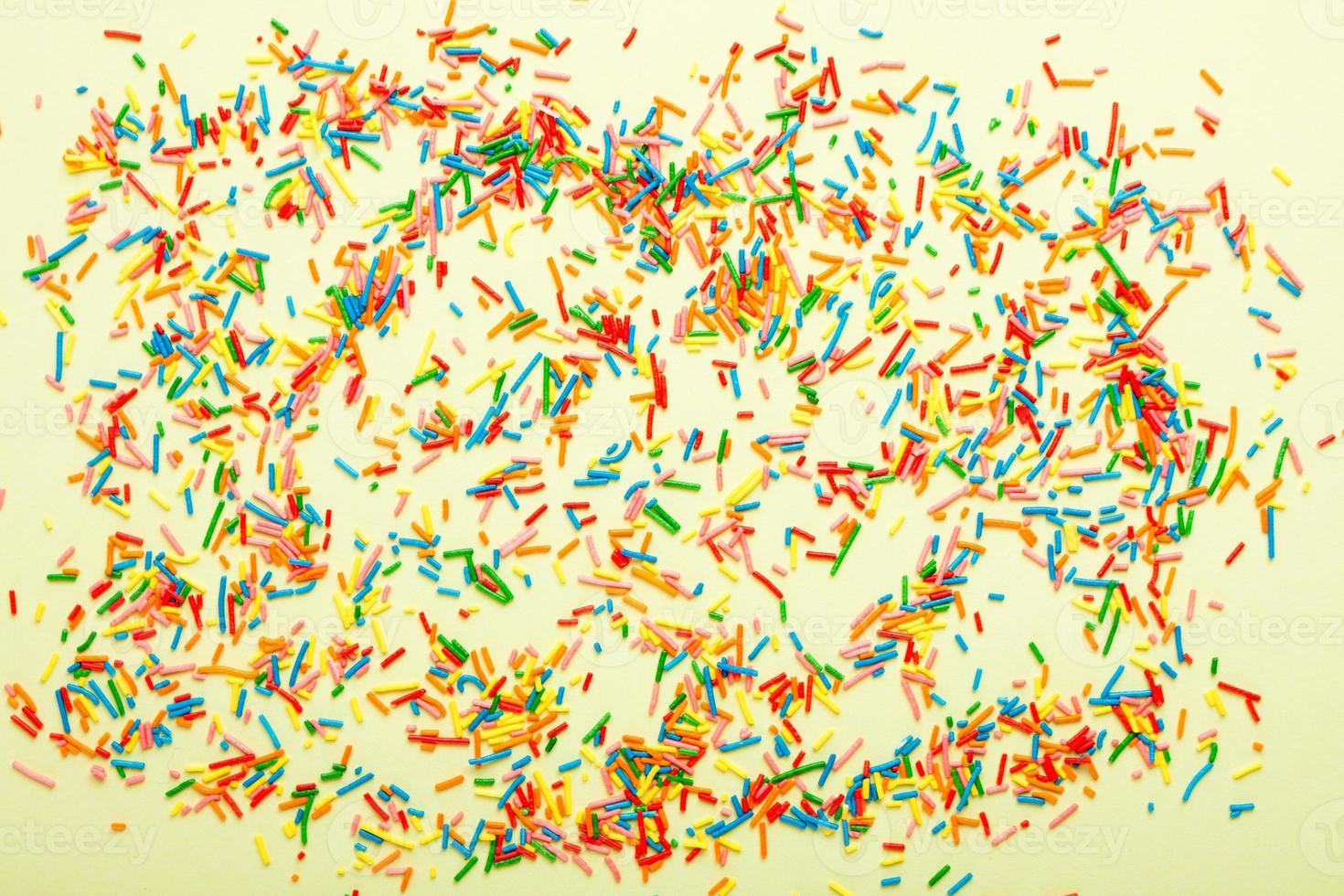 Sweer sugar prinkles background. Sugar prinkles backdrop. photo