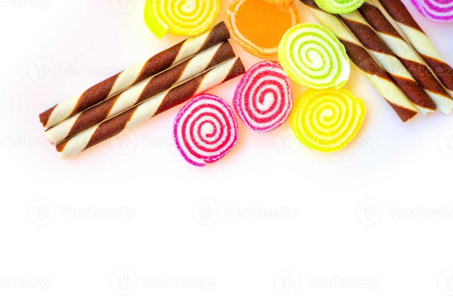 colorful sweets and sugar candies on a white background photo