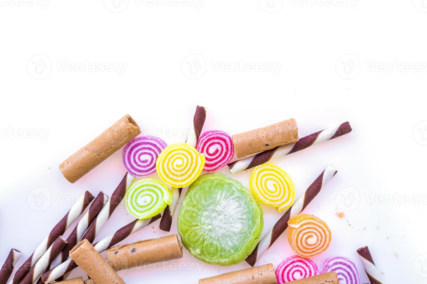 colorful sweets and sugar candies on a white background photo