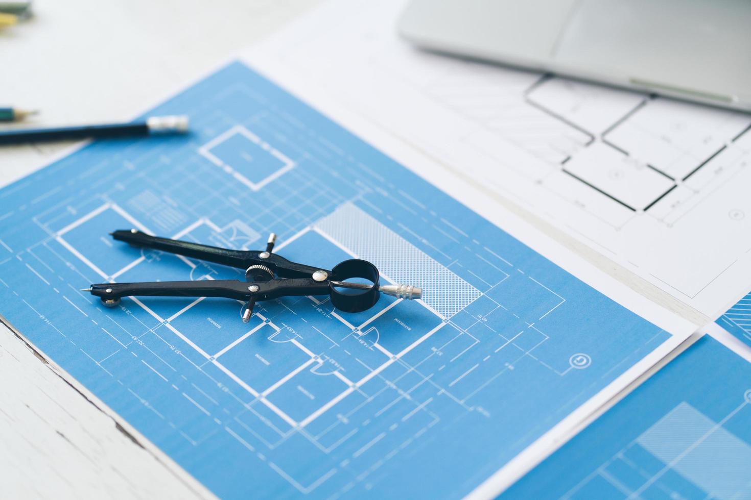 Photo of several drawings for the project engineer jobs, Engineers and architects concept.