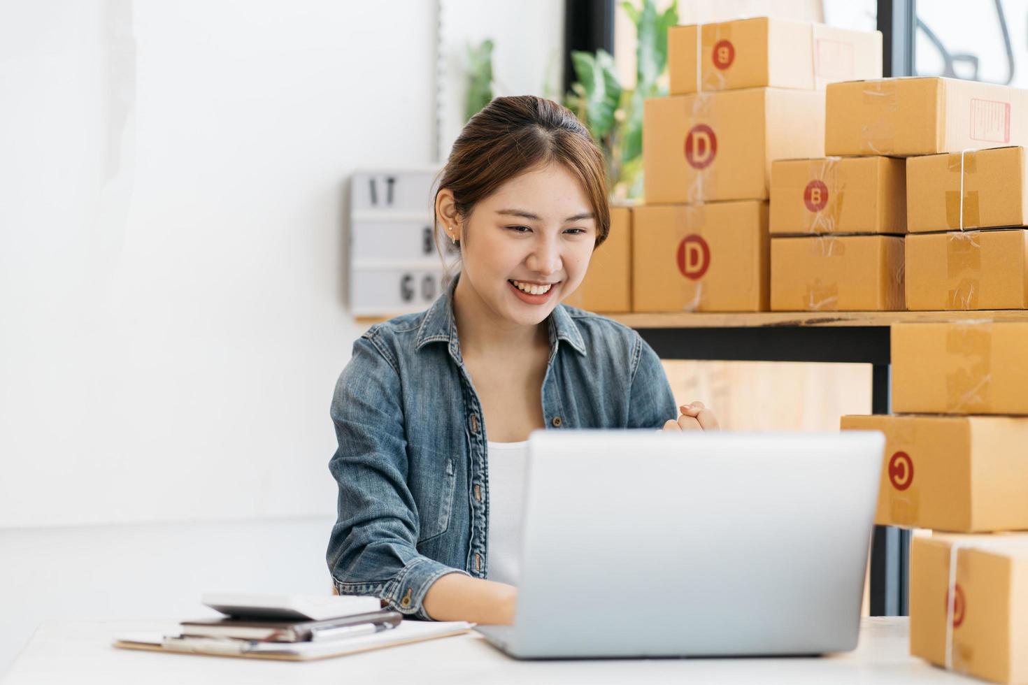 Young business start up online seller owner using computer for