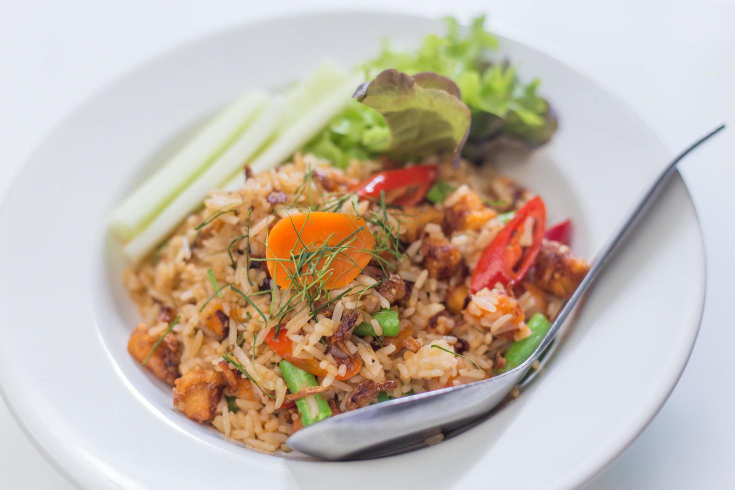 Fried eice with salted egg and cracklings photo