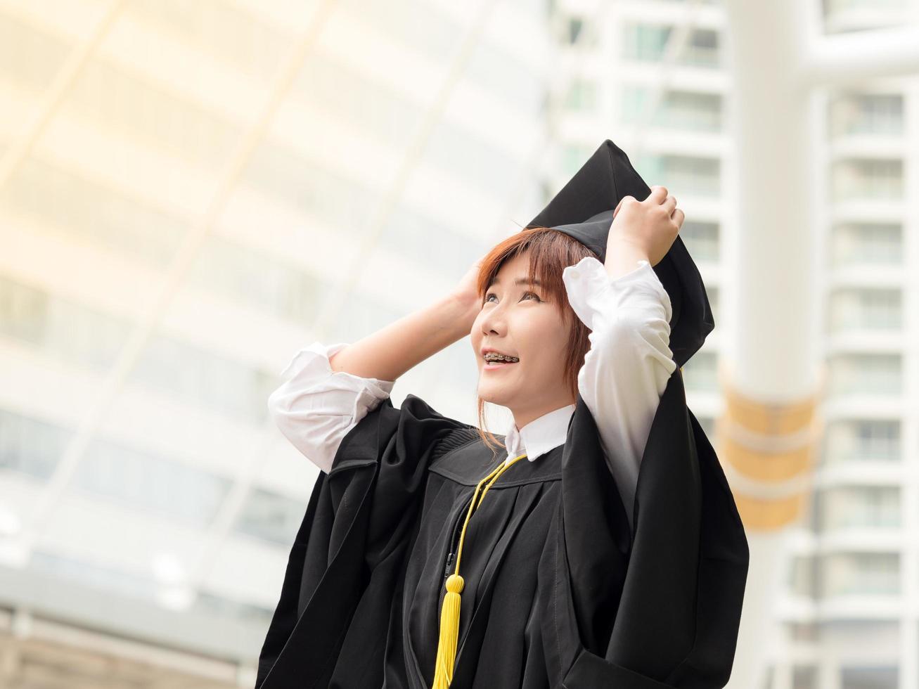 Woman portrait smiling and happy on her graduation day photo